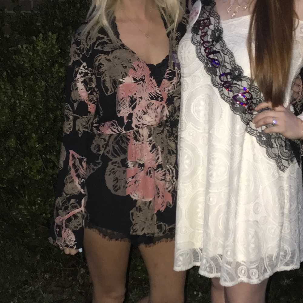 Pink and black lace romper